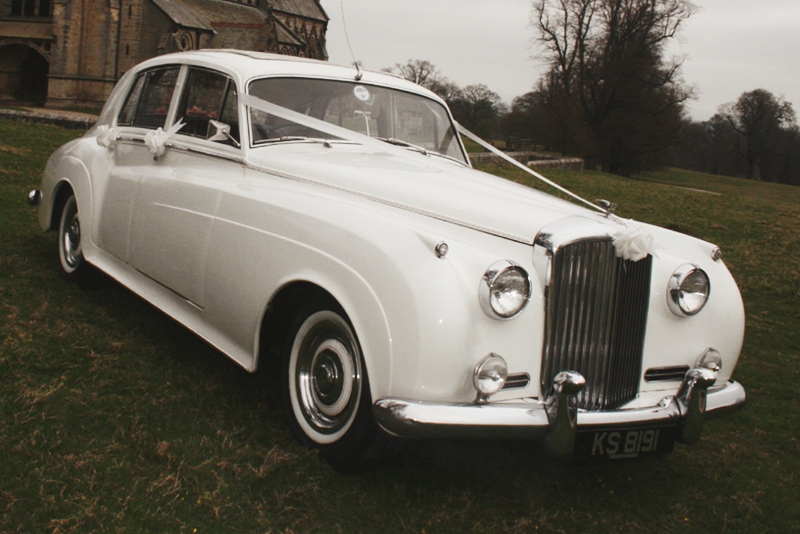 Bentley S1 with full sunroof, red leather interior, walnut woodwork and red Wilton carpeting