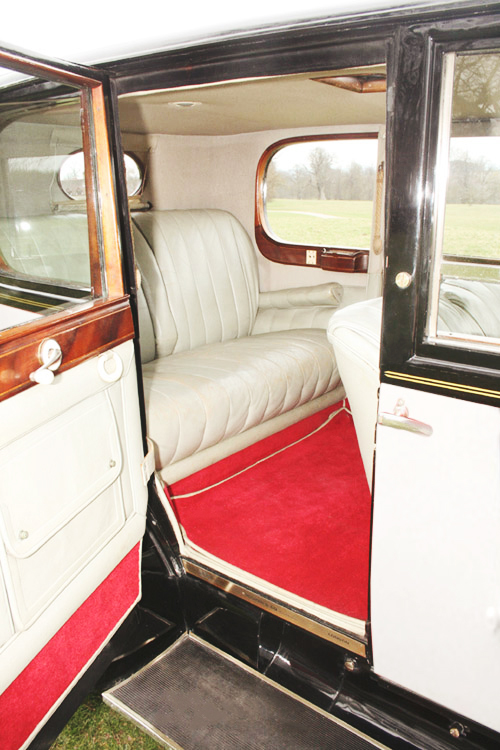 Mid-grey leather interior and cherry red carpeting 1929 Rolls Royce for hire