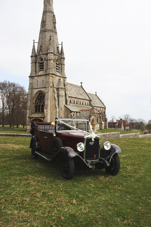 1930 Austin 20 Tourer with Black and Wine Coachwork, black leather interior, cherry red carpeting and a fully convertible roof