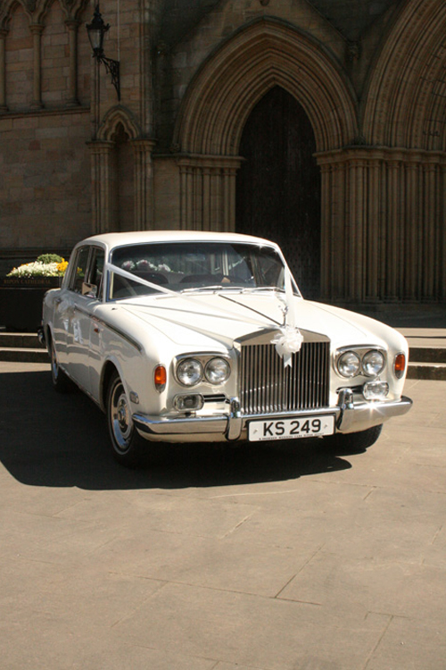 1972 Rolls Royce, 4-door saloon in Porcelain White Coachwork and Tan leather interior for hire as a wedding car